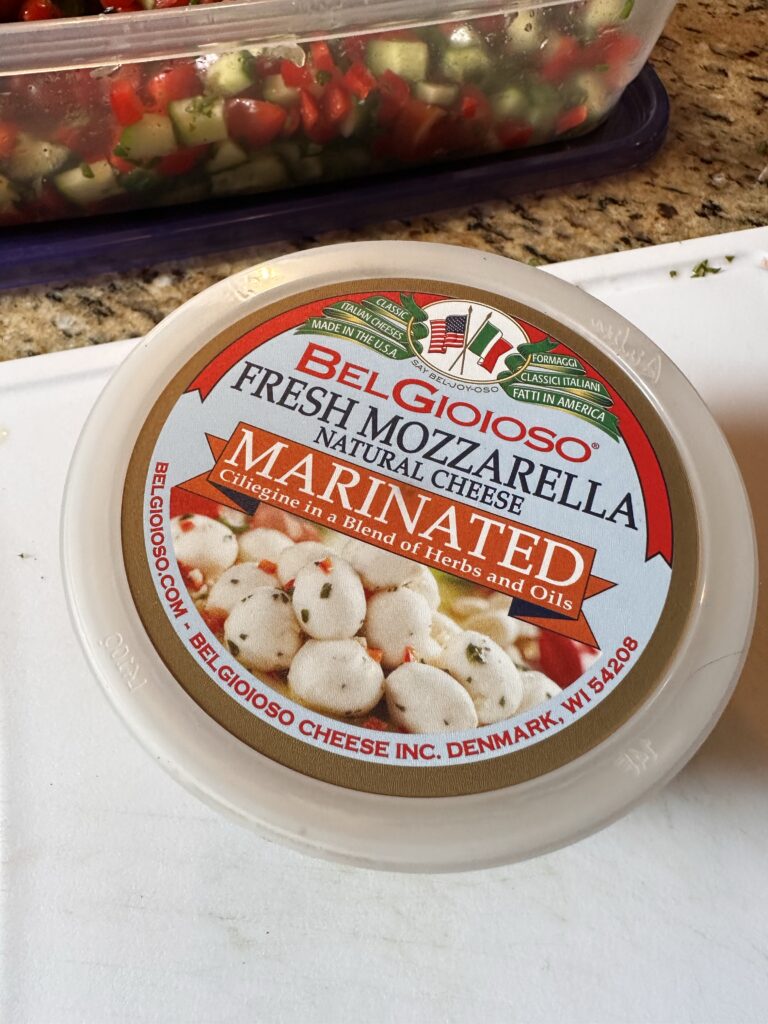 A container of marinated mozzarella