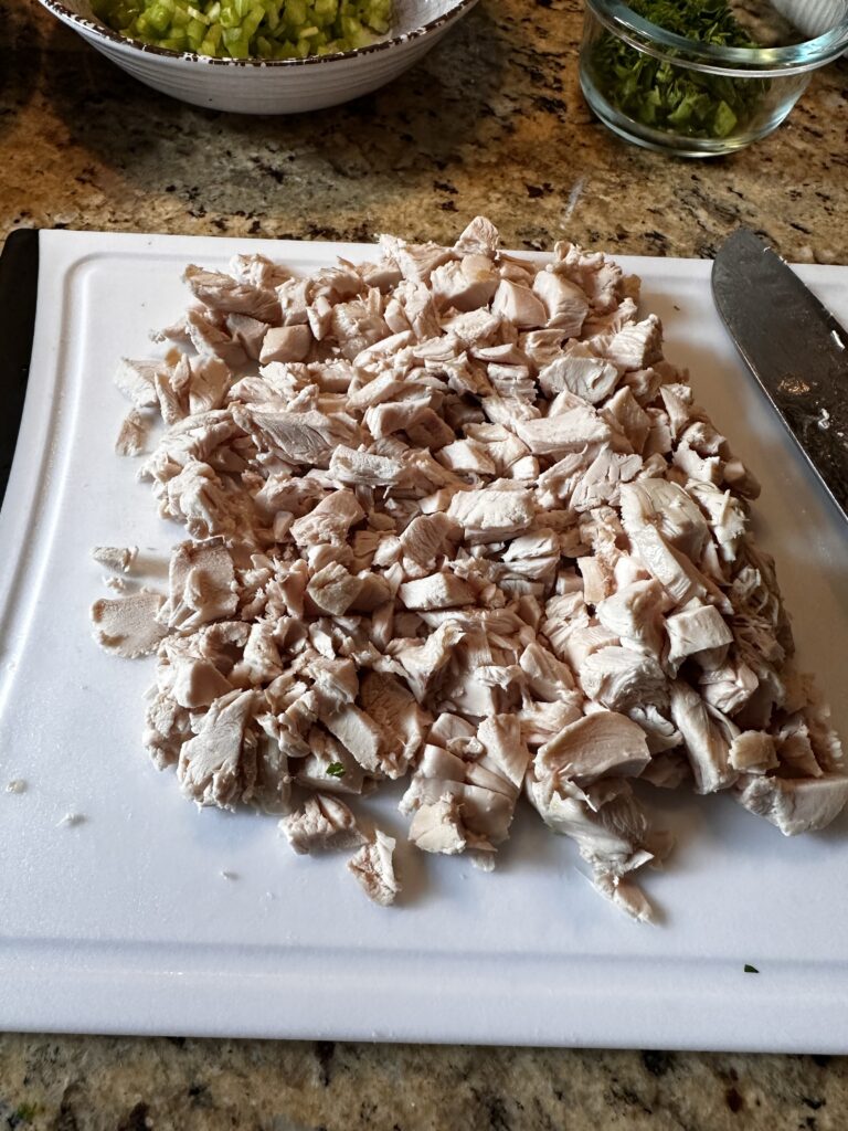 Diced chicken on a cutting board