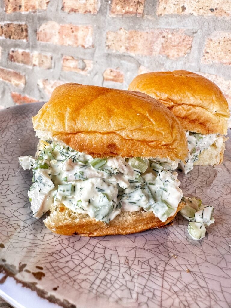 Two chicken salad sandwiches on rolls
