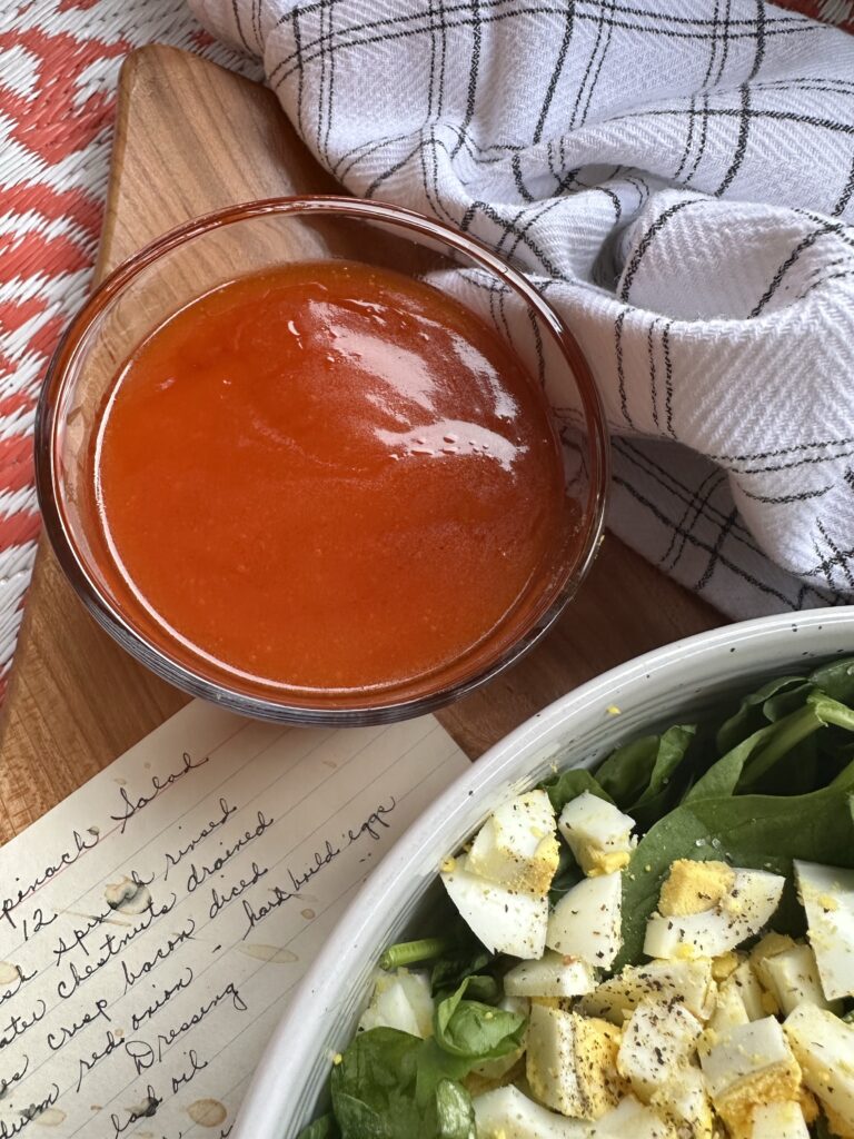 A cup of tangy red dressing