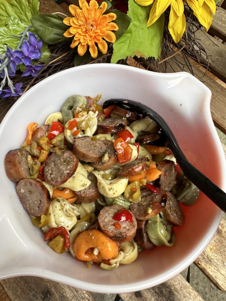 Sausage and peppers with tortellini in a bowl