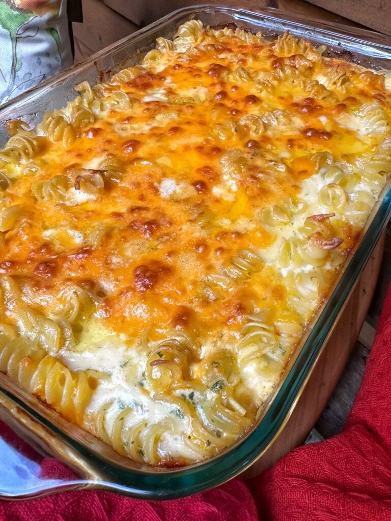 Decadent Mac and Cheese in a glass baking dish
