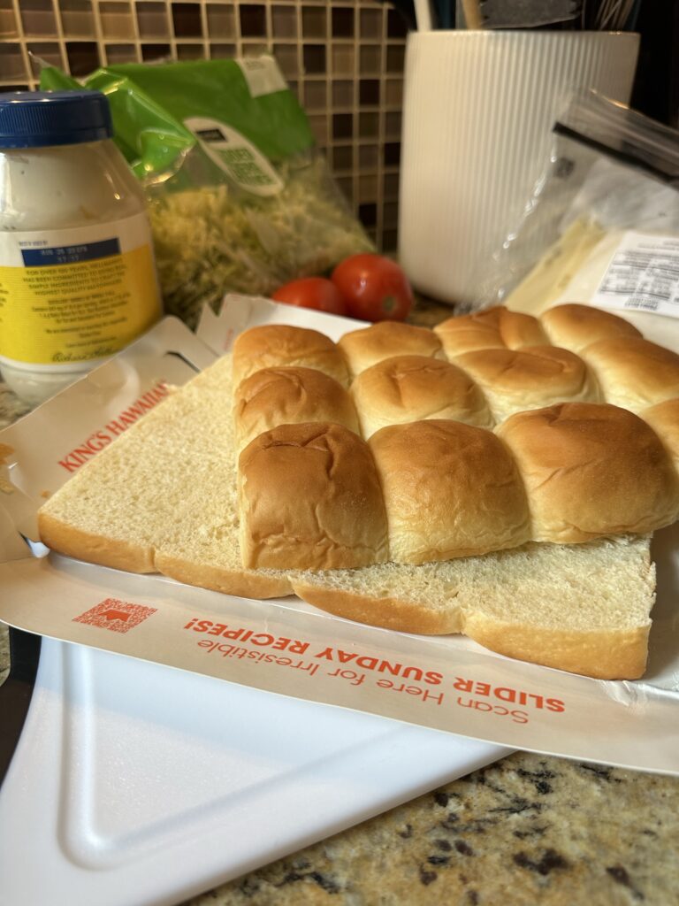 The slab of Hawaiian rolls cut in half horizontally