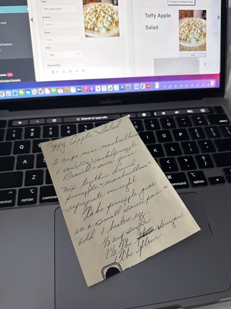 A post-it note with the Taffy Apple Salad recipe on a laptop that has the recipe card for this article open