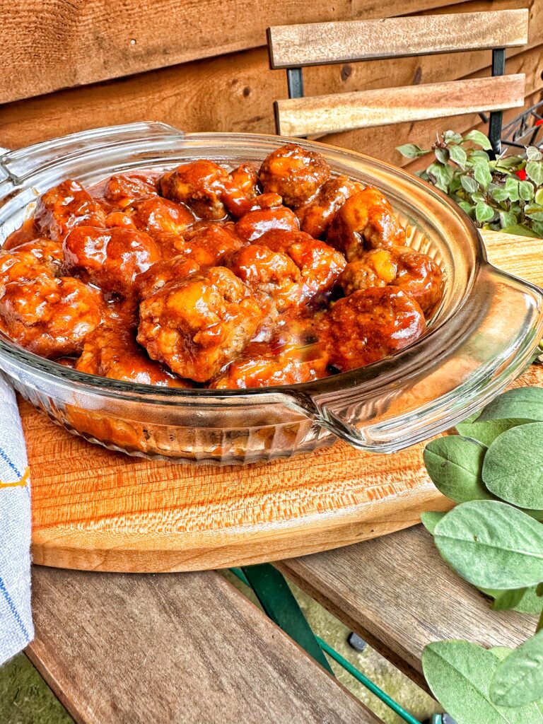 The finished meatballs in a glass dish