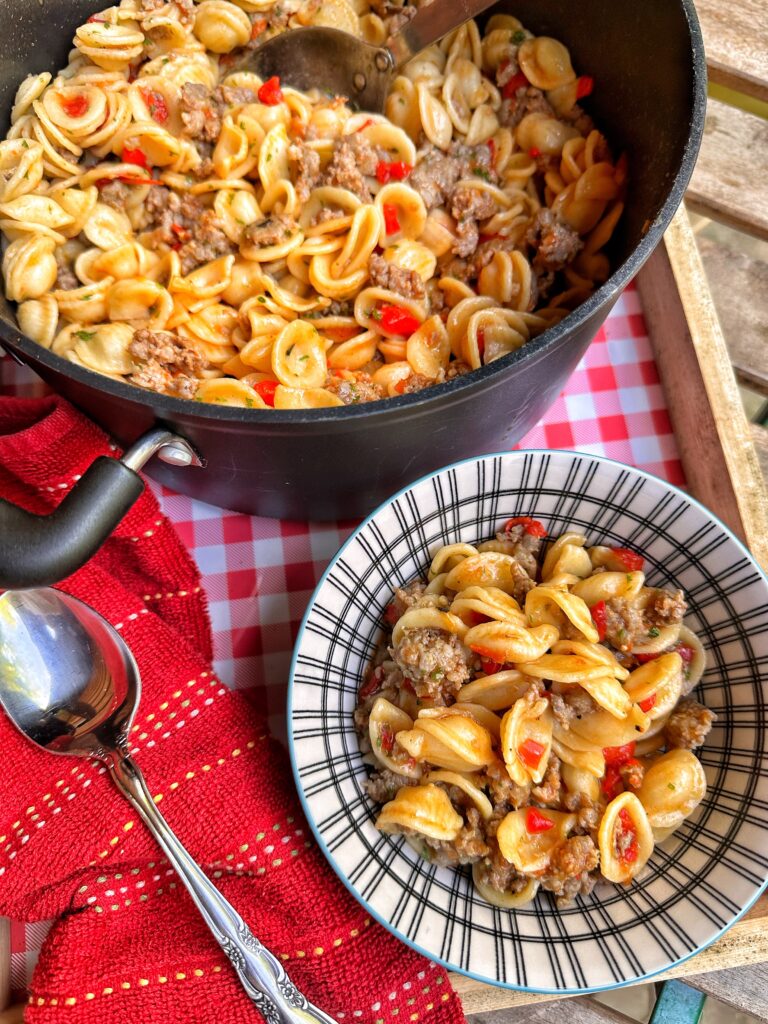 Pasta with sausage and red pepper sauce