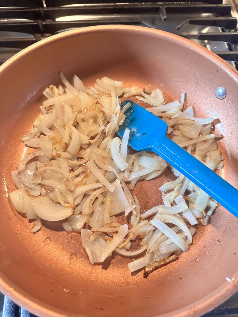 Onions cooking in a pan