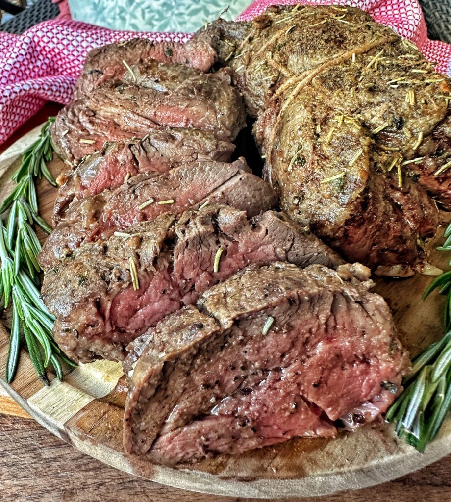 Sliced, medium rare beef tenderloin