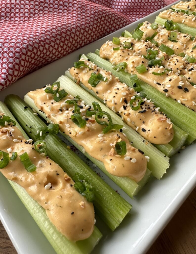 The finished stuffed celery, complete with toppings