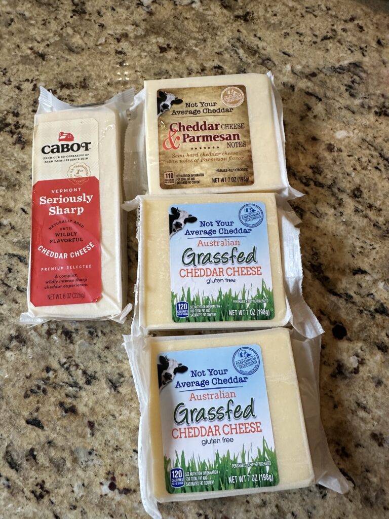 A mix of different cheddar cheese brands