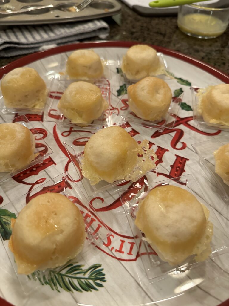 The tartlets on plastic serving dishes before the bacon is added