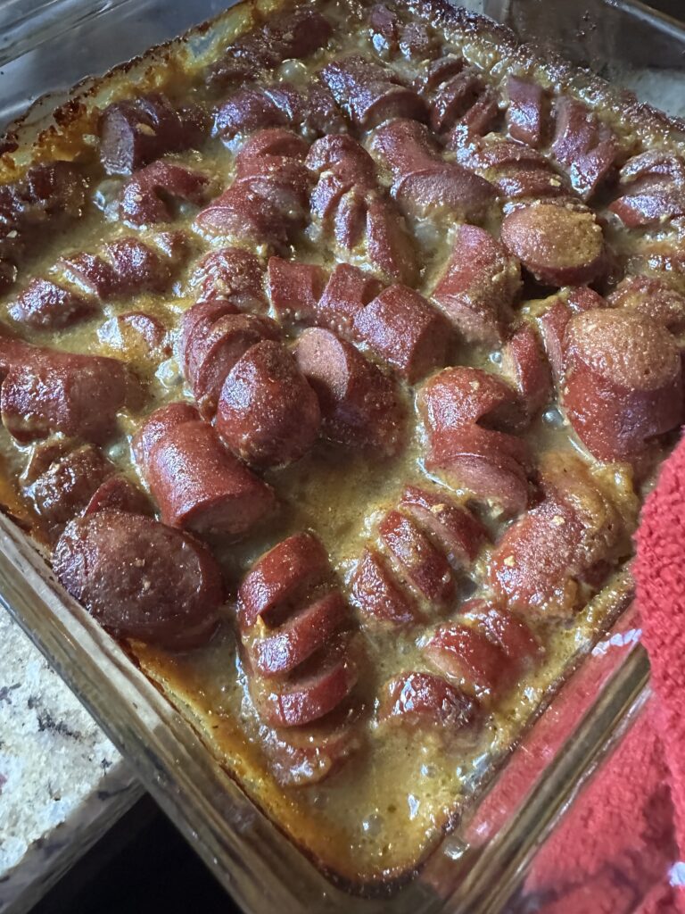 Cooked sausages in mustard sauce