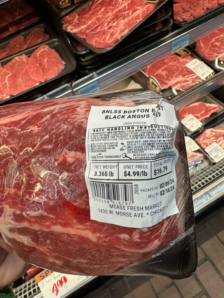 A package of boneless black angus beef roast
