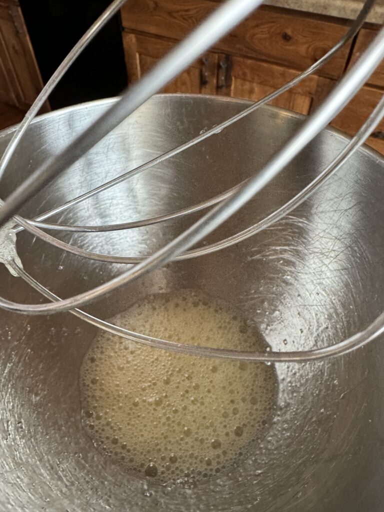 Foamy egg whites in the mixing bow
