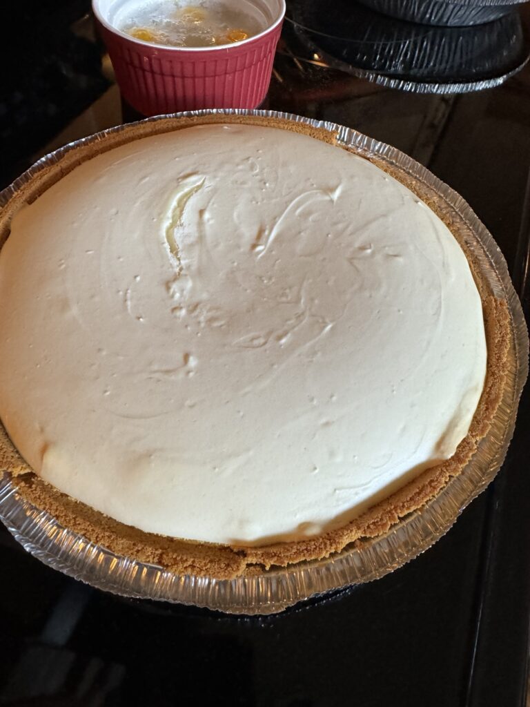 The cheesecake after the first bake