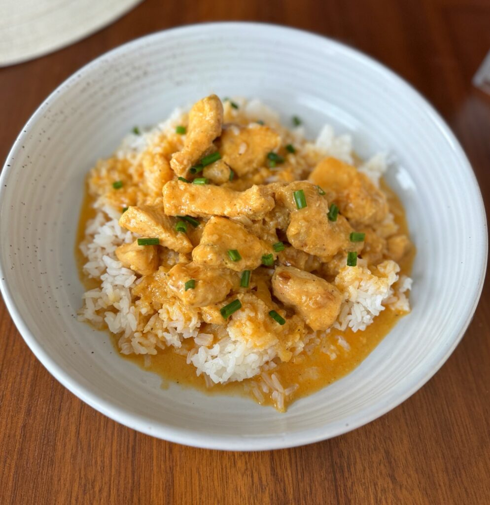 The finished lobster cream chicken over rice