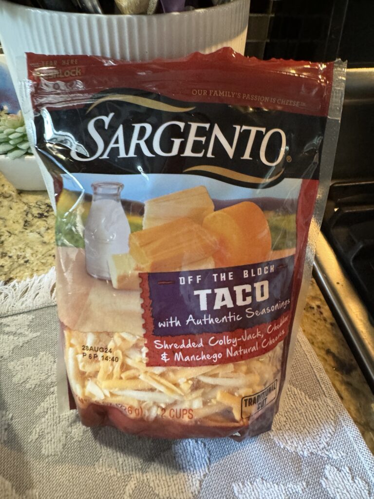 A package of Sargento brand shredded taco cheese blend