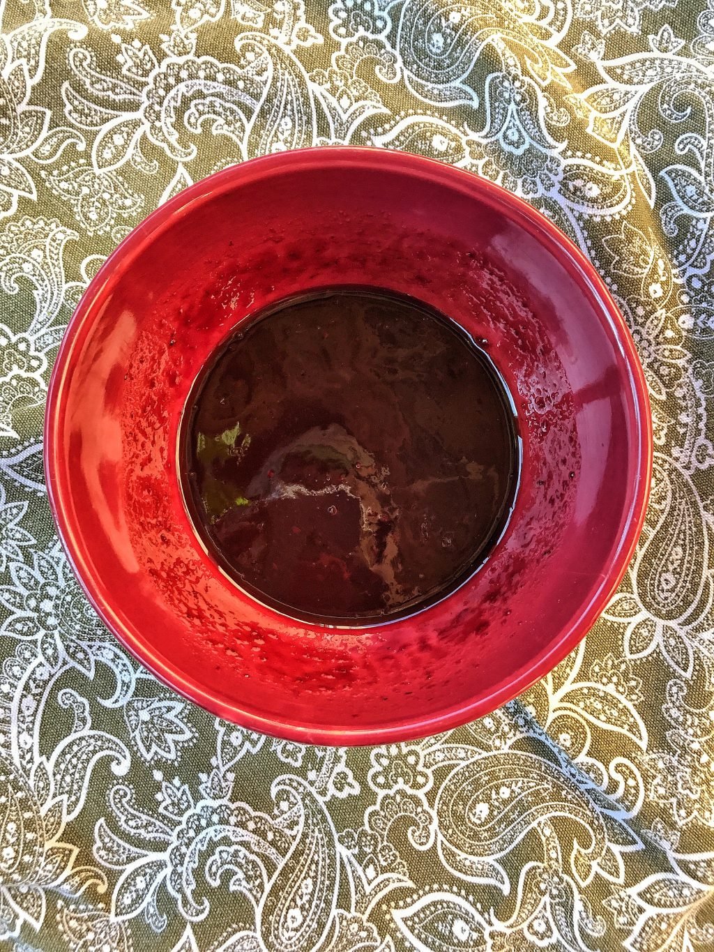 The pork glaze in a red bowl