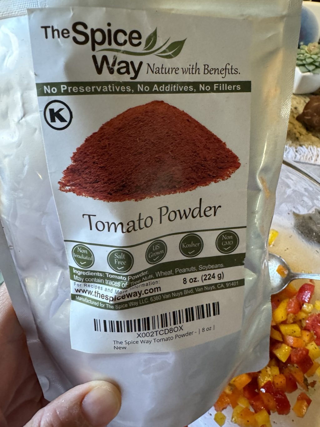 A package of The Spice Way tomato powder