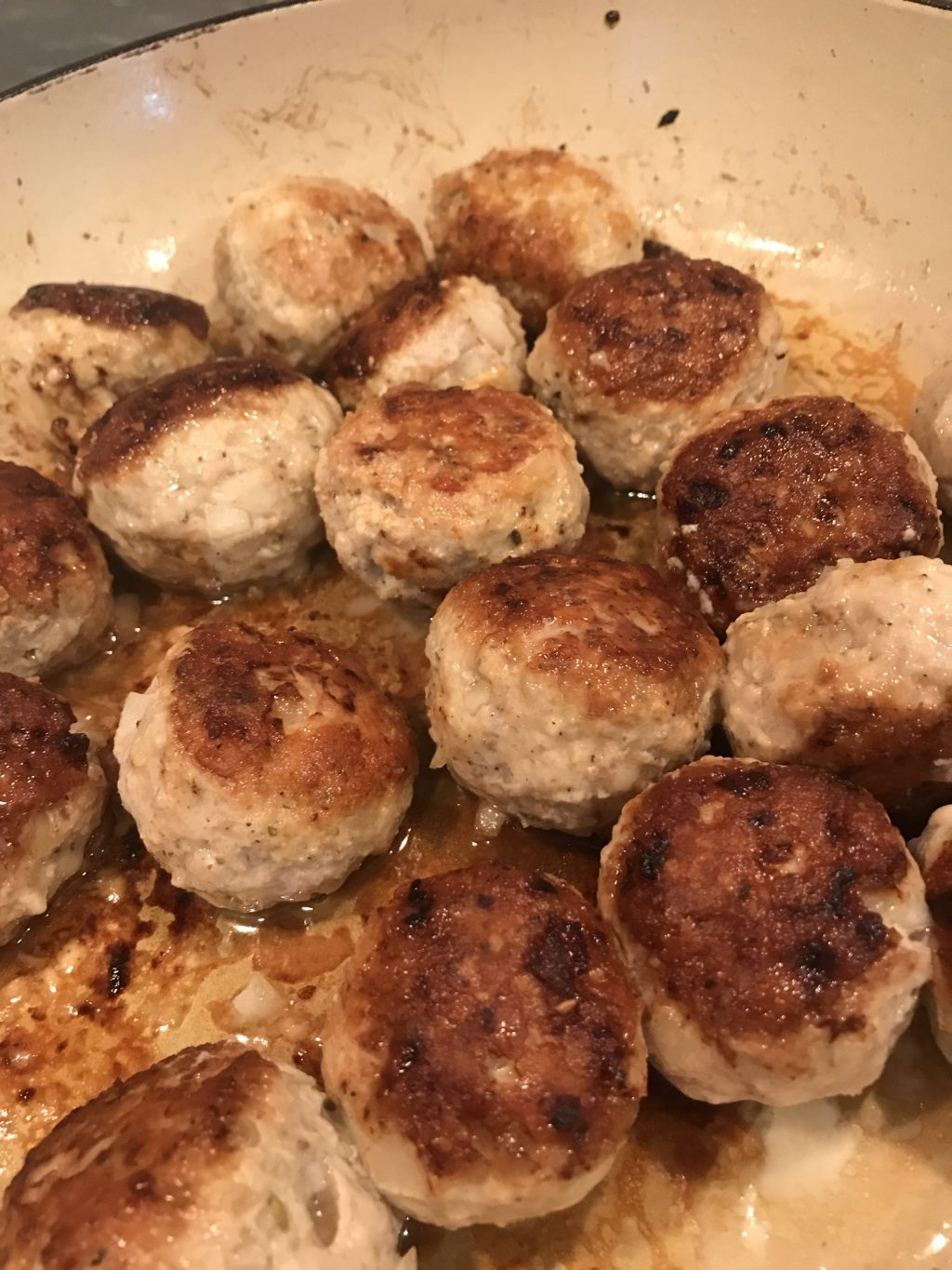 A close up of browned meatballs