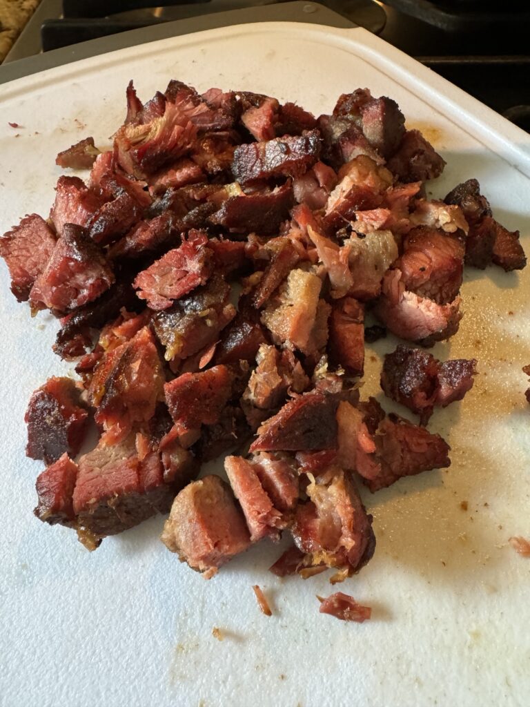 Burnt ends on a cutting board