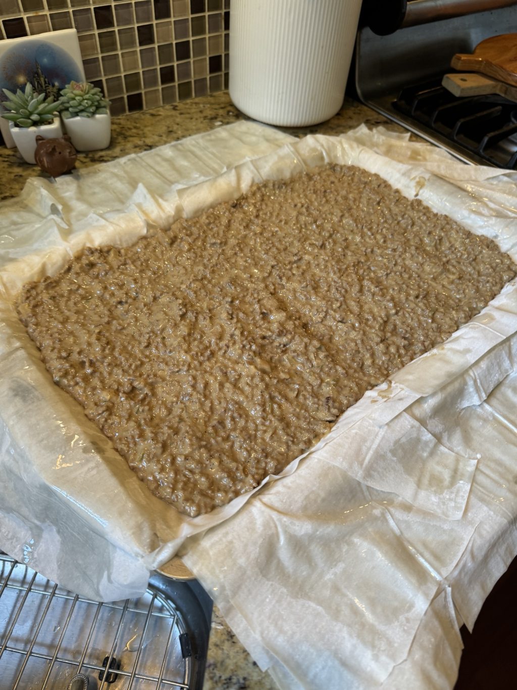 A meat mixture placed inside the raw Phyllo dough