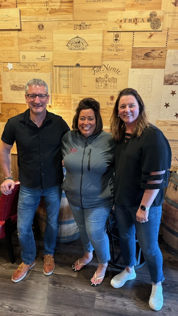 Me with the owners of Mary Kate's wine bar