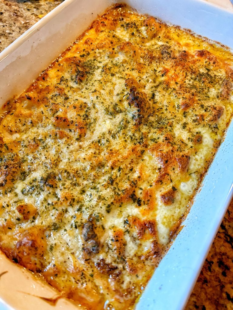 A baking dish of cheesy cauliflower.