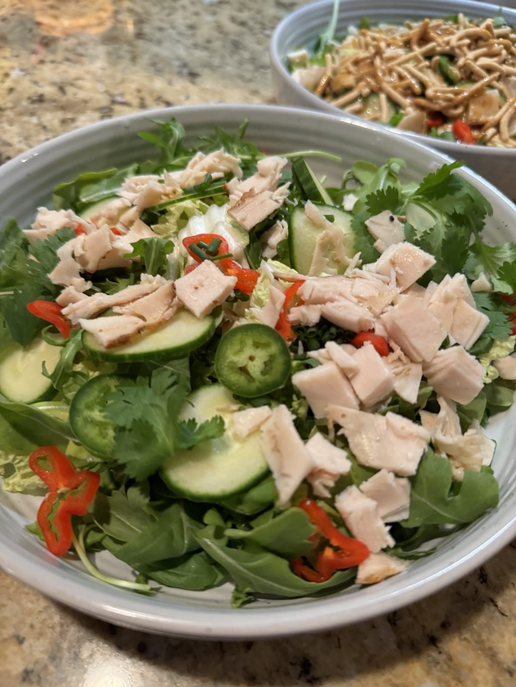 A close up of undressed, Chinese chicken salad.