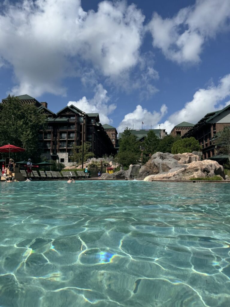 A shot taken from the pool of the Wilderness Lodge Resort at Disney. The Lodge can be seen in the background.