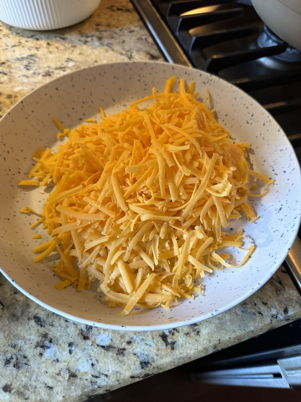 Shredded cheese in a bowl