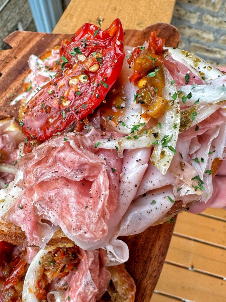 A close up of an open faced sub sandwich.