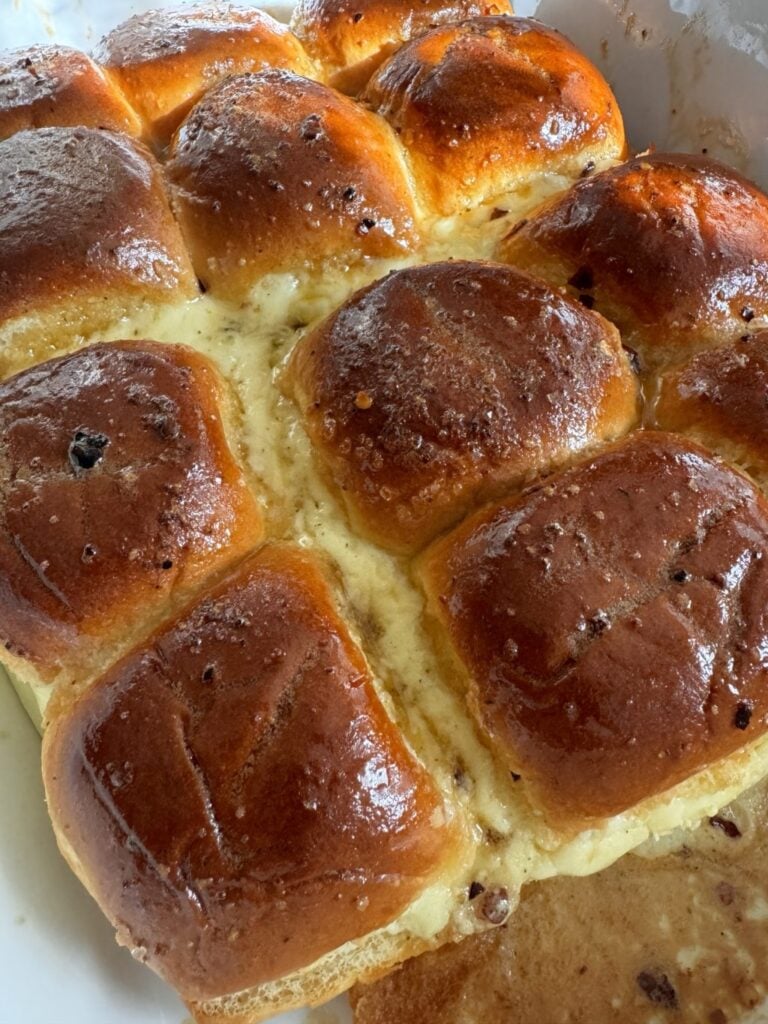 Honeyed rolls with cheese oozing out in between.