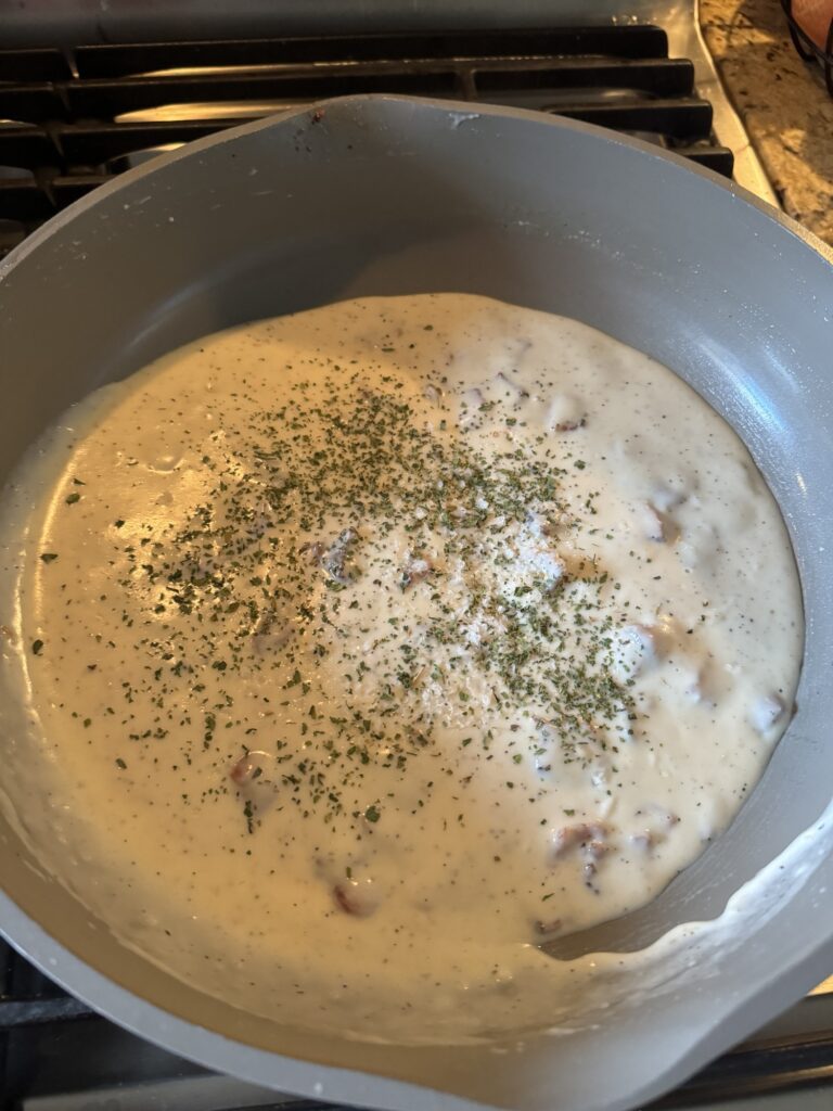 White bacon gravy in a pot.