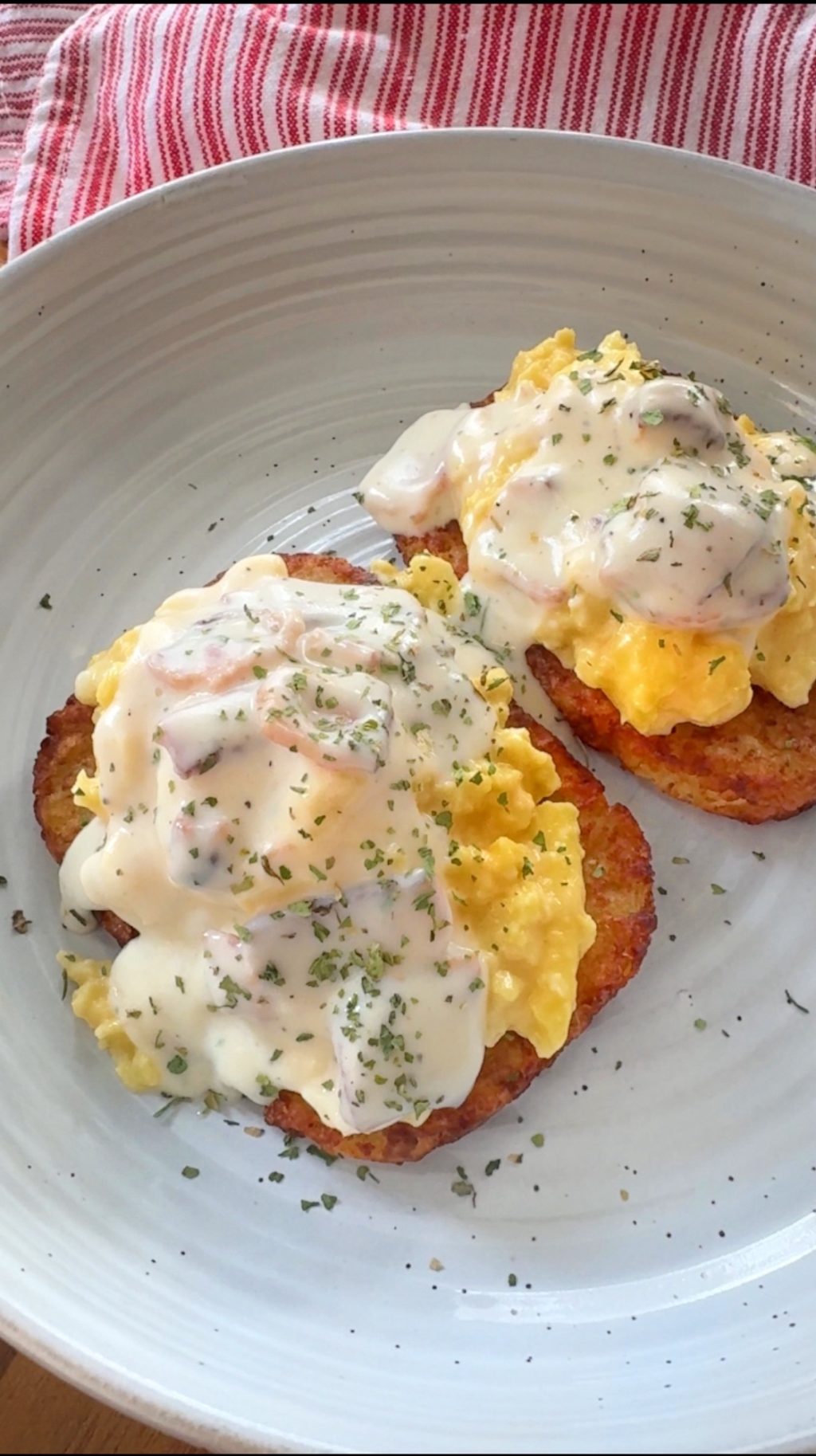 The finished hash browns topped with egg and bacon gravy.