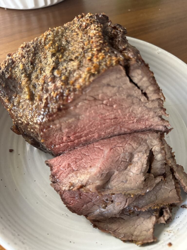 A close up of the beef roast slices.