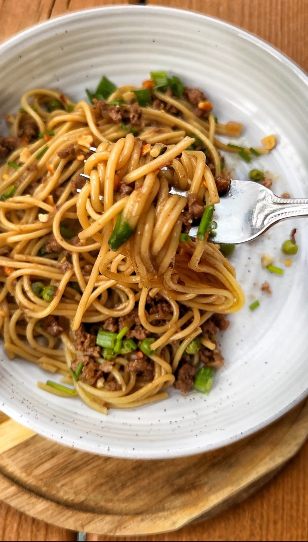 A close up of a forkful of the finished pasta.