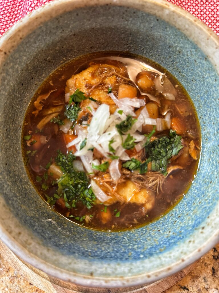 A close up of the Tamale Soup from above.