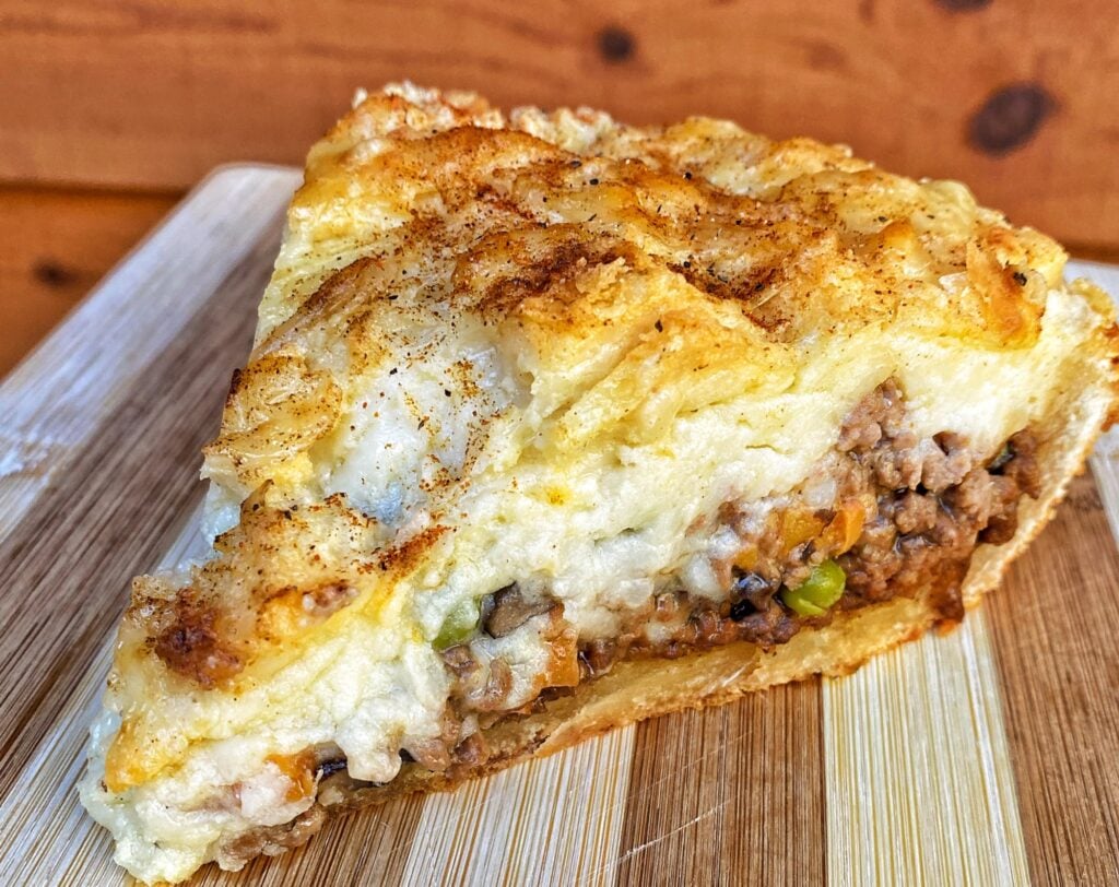 A slice of beef and potato pie