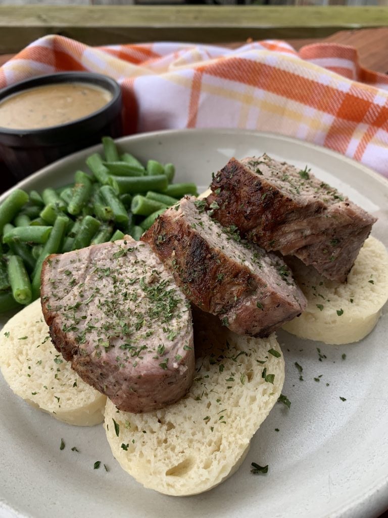 Pork slices on Czech bread dumplings that have been steamed.