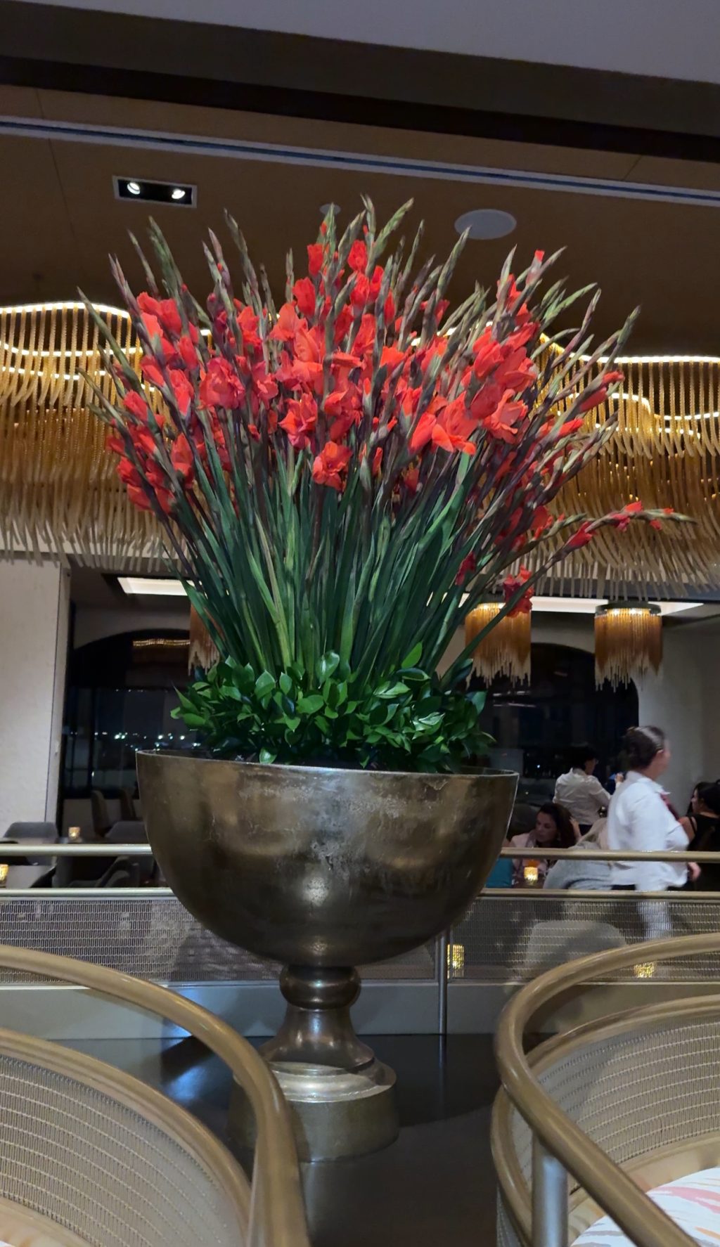 Flowers in a centerpiece on a table