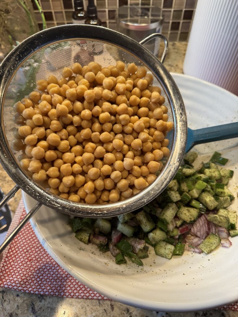Chick peas in a strainer