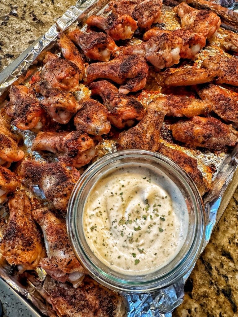 Crispy Oven Baked Chicken Wings with dipping sauce.