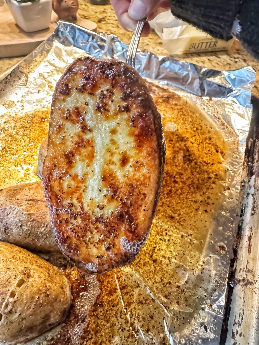 A finished baked potato half