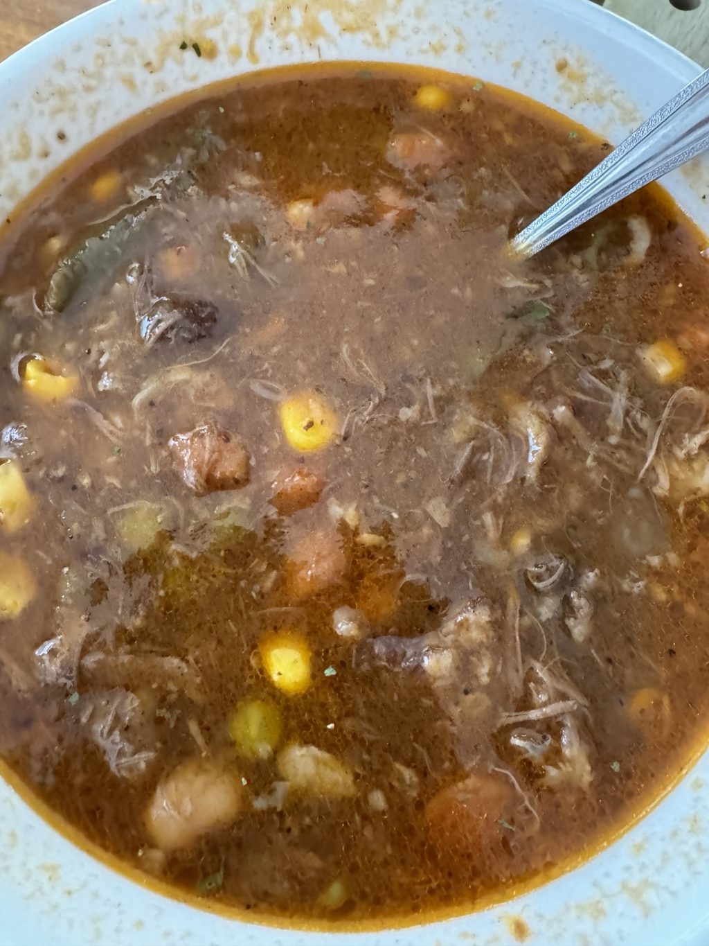 A close up of a bowl of oxtail soup