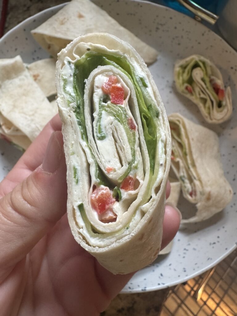 A finished funeral sandwich roll up