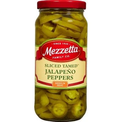 A jar of sliced, tamed jalapenos