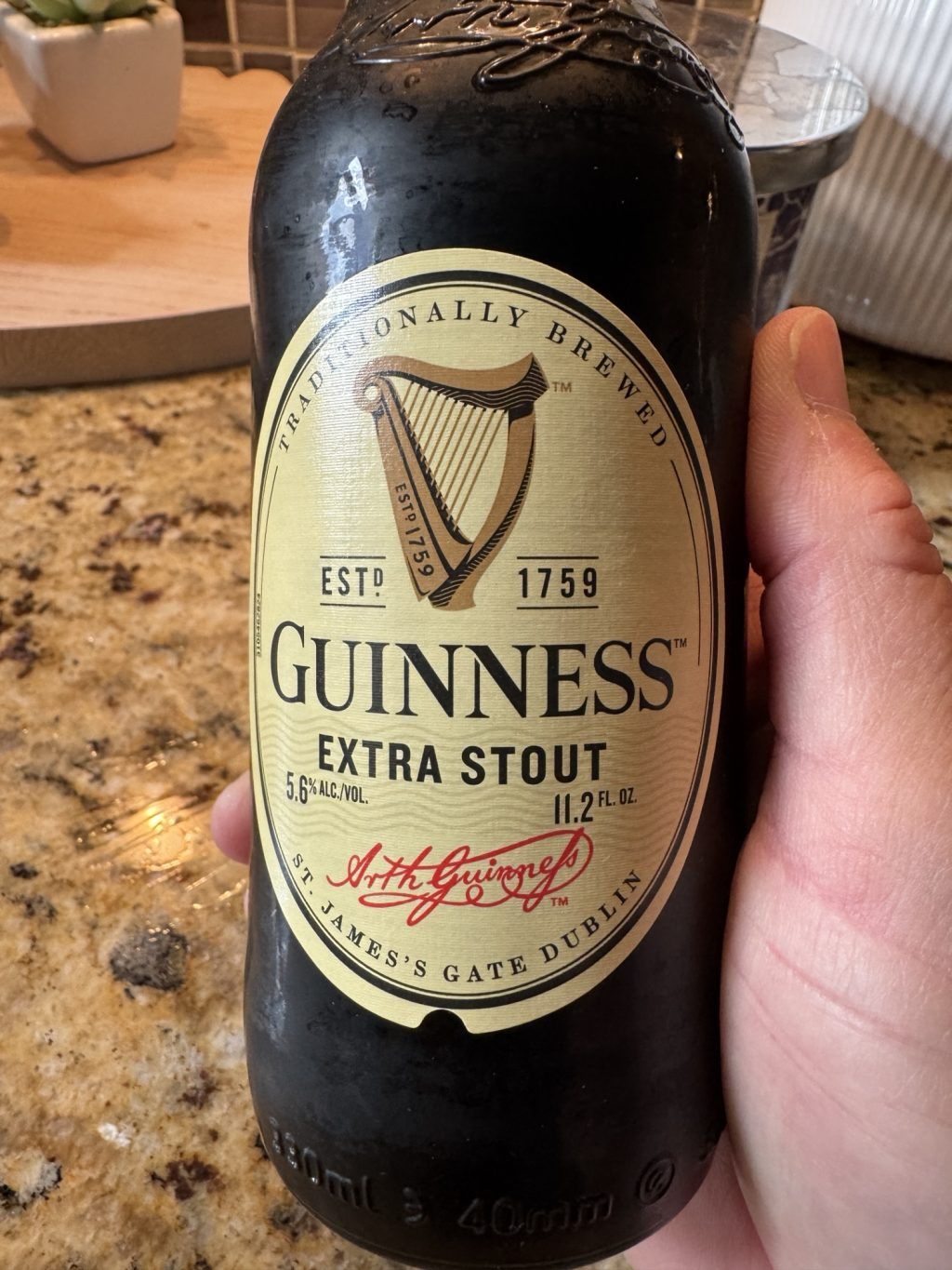 A bottle of Guinness Extra Stout