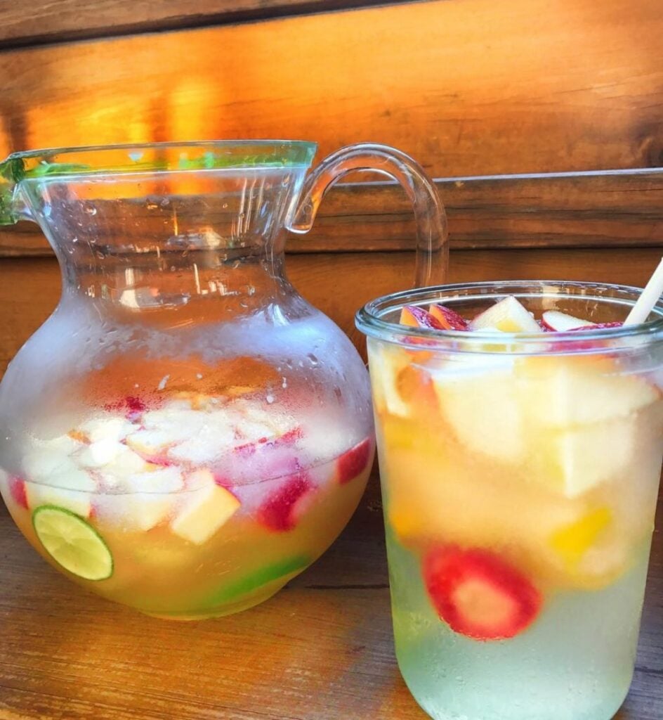 A pitcher of pink lemonade sangria