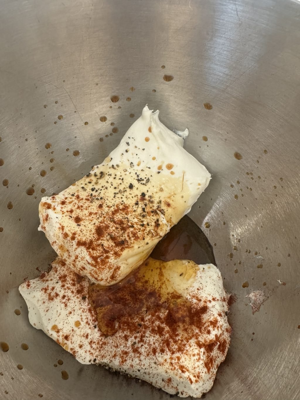 The dip ingredients in a metal bowl